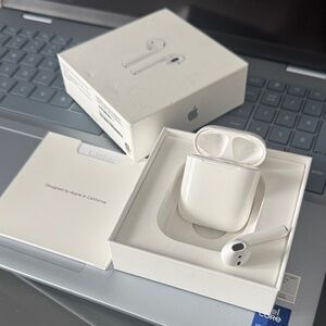Apple AirPods with Charging Case - White